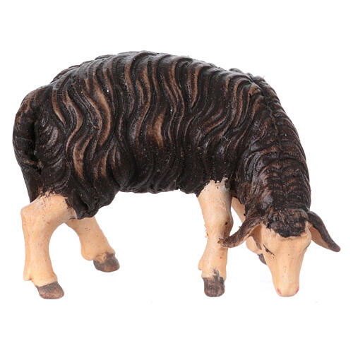 Mouton noir qui mange bois peint crèche Kostner 9,5 cm 1