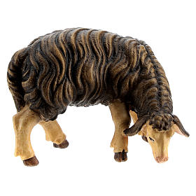 Mouton noir qui mange bois peint crèche Kostner 12 cm