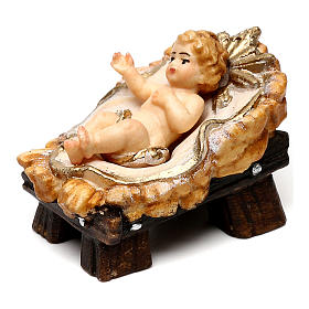Gesù Bambino in culla legno dipinto presepe Rainell 9 cm Valgardena