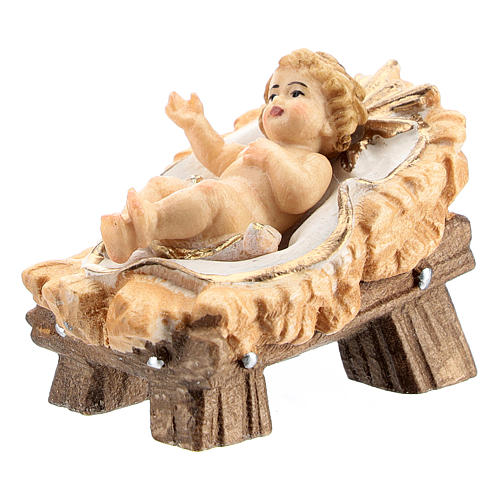 Baby Jesus with manger in painted wood for 11 cm Rainell Nativity scene, Val Gardena 2