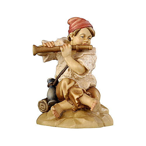 Boy sitting playing flute 11 cm, nativity Rainell, in painted Valgardena wood 1