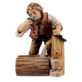 Boy at the fountain in painted wood for 11 cm Rainell Nativity scene, Val Gardena