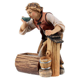 Boy at the fountain in painted wood for 11 cm Rainell Nativity scene, Val Gardena