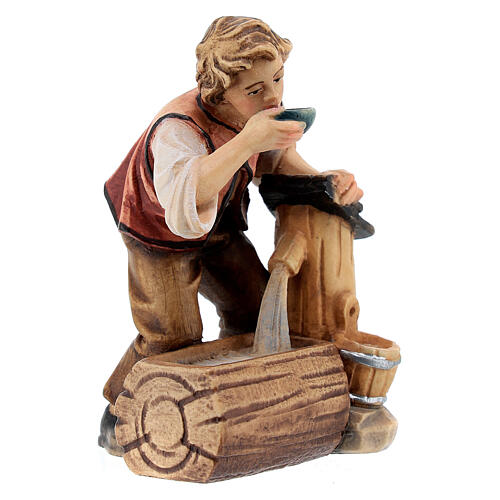 Niño con fuente madera pintada belén Rainell 11 cm Val Gardena 3