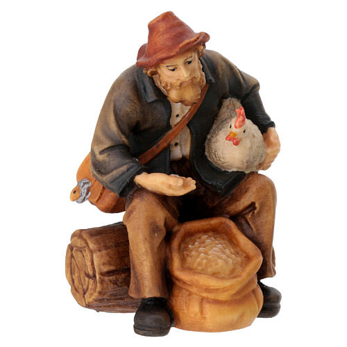 Sitting shepherd with grains in painted wood for 9 cm Rainell Nativity scene, Val Gardena 3