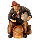 Sitting shepherd with grains in painted wood for 9 cm Rainell Nativity scene, Val Gardena s1