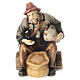 Sitting shepherd with grains in painted wood for 9 cm Rainell Nativity scene, Val Gardena s1