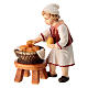 Enfant avec panier bois peint Val Gardena crèche Rainell 9 cm s1