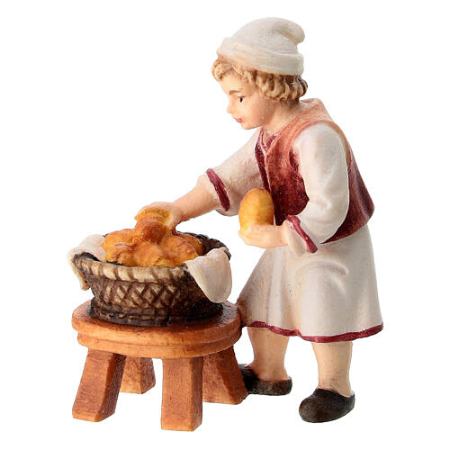 Bambino con cesto legno dipinto presepe Rainell 9 cm Valgardena 1