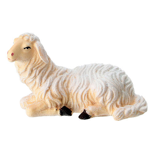 Lying sheep looking to its left in painted wood from Valgardena for Rainell Nativity Scene 9 cm 1
