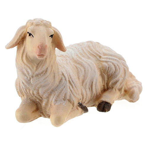 Lying sheep looking to its left in painted wood from Valgardena for Rainell Nativity Scene 11 cm 2