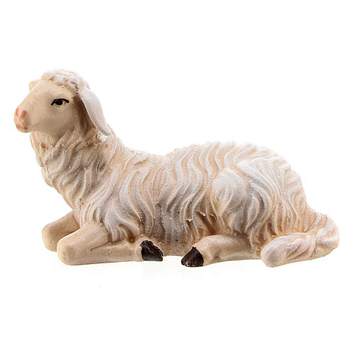 Lying sheep looking to its right in painted wood from Valgardena for Rainell Nativity Scene 9 cm 1