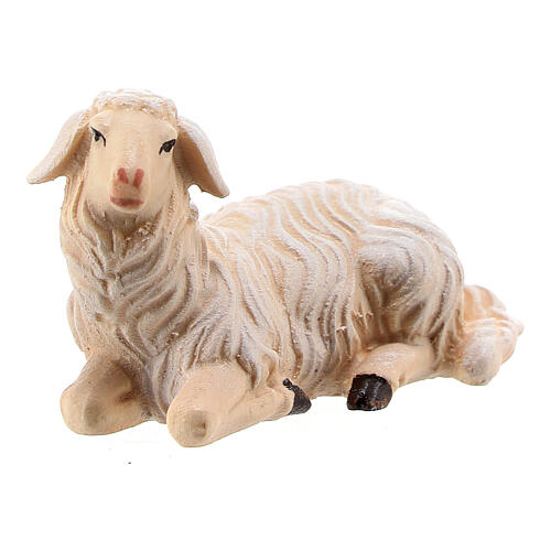 Lying sheep looking to its right in painted wood from Valgardena for Rainell Nativity Scene 9 cm 2
