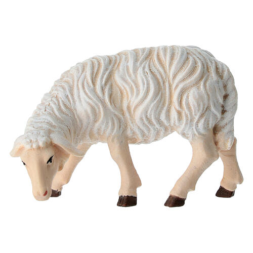 Eating sheep looking to its left in painted wood from Valgardena for Rainell Nativity Scene 11 cm 1
