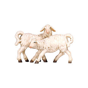 Two lambs playing, 9 cm nativity Rainell, in painted Valgardena wood