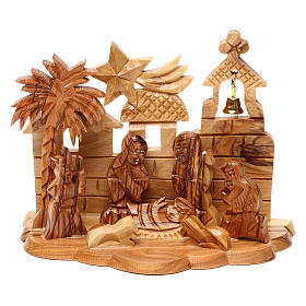 Geburt Christi in einem Stall, Kirche im Hintergrund, stilisiert, aus Olivenholz in Bethlehem gefertigt, 10x15x10 cm