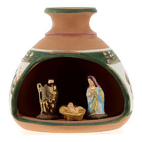 Nativity with shack and star in Deruta terracotta with red and green decoration