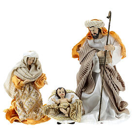 Complete Nativity set in painted resin 10 characters golden 26 cm