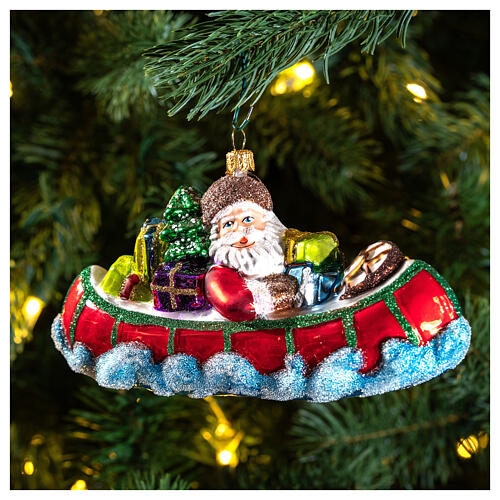 Santa Claus in Canoe Christmas Tree Ornament blown glass 2