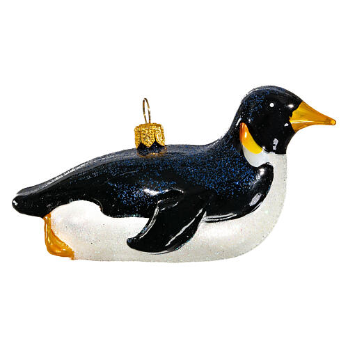 Blown glass Christmas ornament, penguin sledding 1