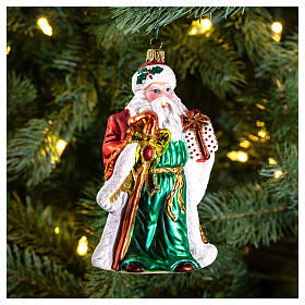 Blown glass Christmas ornament, Santa with gifts