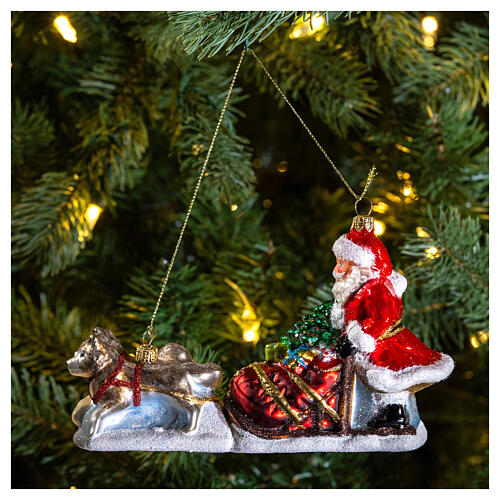Blown glass Christmas ornament, Santa Claus dog sledding 2