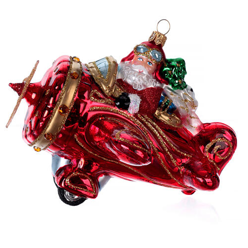 Blown glass Christmas ornament, flying Santa 1