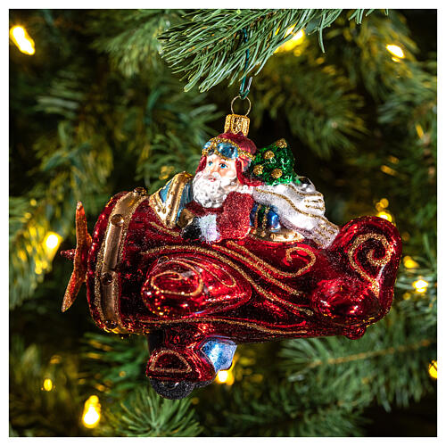 Blown glass Christmas ornament, flying Santa 2