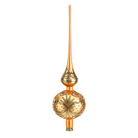 Gold coloured Christmas tree topper with golden decorations
