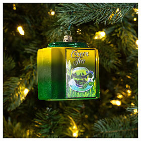 Blown glass Christmas ornament, green tea box