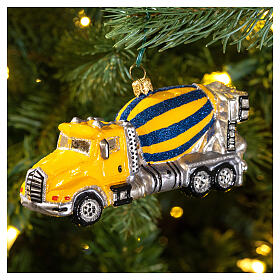 Concrete mixer truck with Christmas tree decoration in blown glass