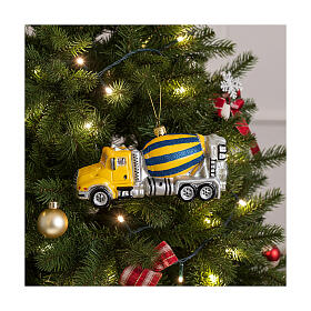 Concrete mixer truck with Christmas tree decoration in blown glass