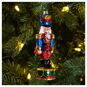 Nutcracker Christmas tree ornament with drum blown glass