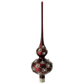 Christmas topper of red blown glass with golden pattern
