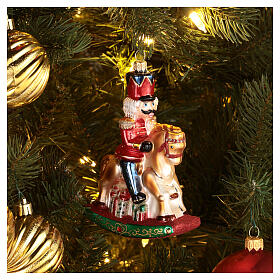 Casse-noisette sur cheval à bascule décoration en verre soufflé sapin de Noël