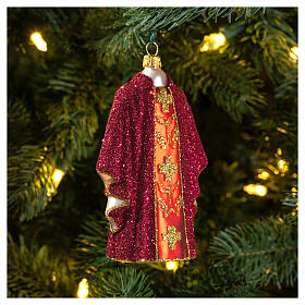 Red priest chasuble, blown glass Christmas ornaments