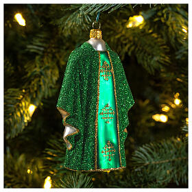 Green priest chasuble, blown glass Christmas ornaments