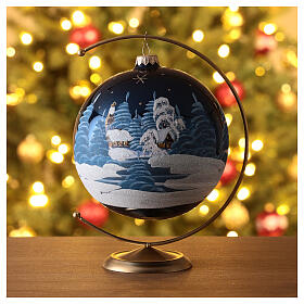 Christmas ball with snowy night landscape on blue blown glass 150 mm