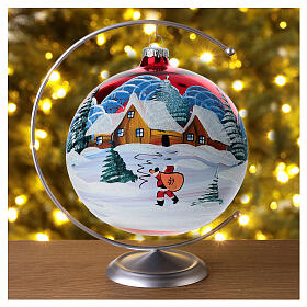 Boule de Noël verre soufflé rouge Père Noël dans paysage enneigé 150 mm