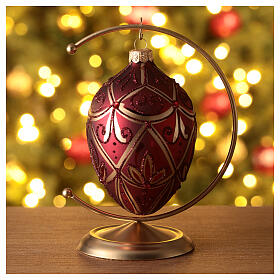 Oval Christmas with red stones, 100 mm, red and golden blown glass