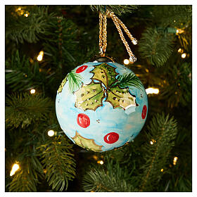Hand-painted 4-inch light blue ceramic Christmas ball with holly branch by Dellarte Ceramiche