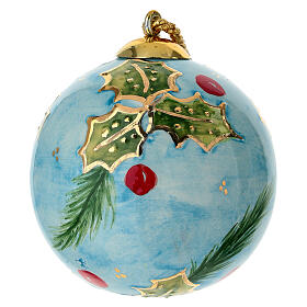 Ceramic Christmas ball by Dellarte Ceramiche, light blue background and holly, 3 in