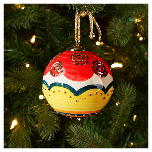 Hand-painted red ceramic Christmas ball with gold spirals by Dellarte Ceramiche, 4 in 2