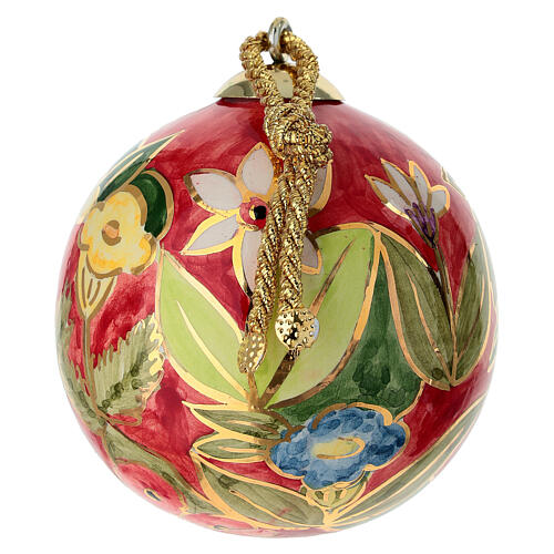 Dellarte Ceramiche hand-painted Christmas tree decoration with colourful floral pattern on red background, 3 in 3