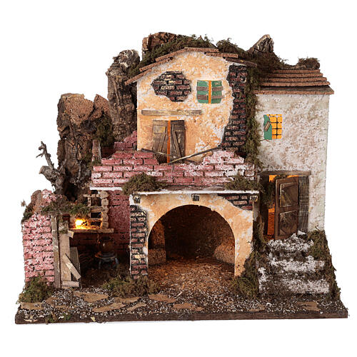 Aldeia com pórtico e muros de tijolos, luzes e fogo, Natividade figuras altura média 10 cm; medidas: 38x45x30 cm 6