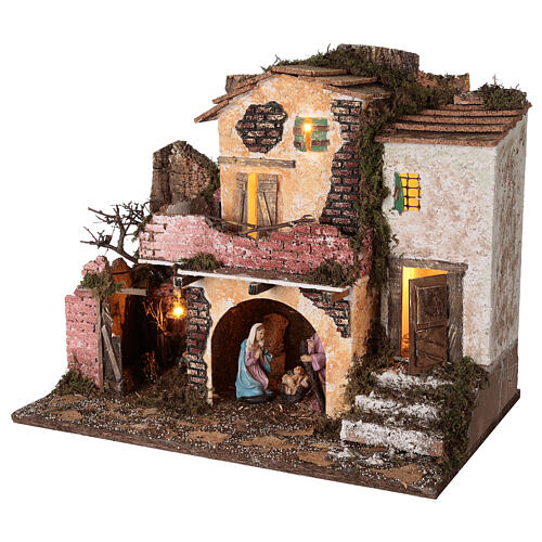 Village with brick walls lights and fire 40x45x30 cm Nativity 10 cm 3