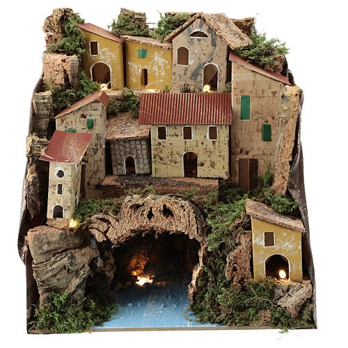 Aldeia em miniatura com casas iluminadas e rio subterrâneo para presépio; medidas: 25x24x21 cm 1
