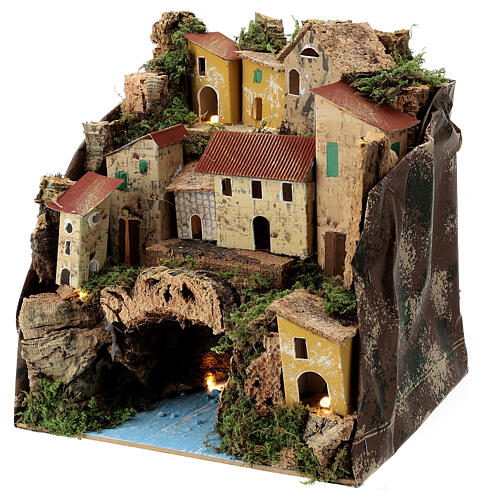 Aldeia em miniatura com casas iluminadas e rio subterrâneo para presépio; medidas: 25x24x21 cm 2