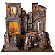 Illuminated village with laundry 40x45x35 for statues 10 cm s1