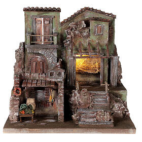 Lighted nativity village with stable and shop 45x45x35 cm for 10 cm figures
